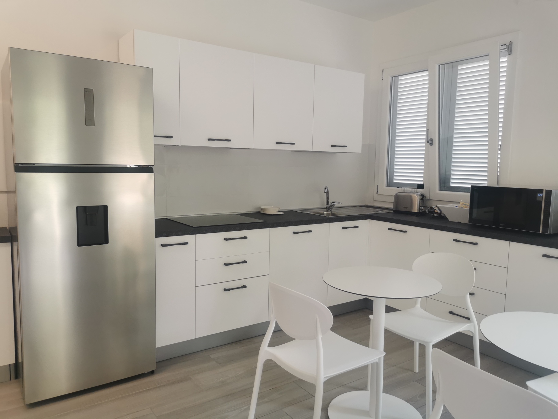 Punta Ala Rooms zona comune cucina